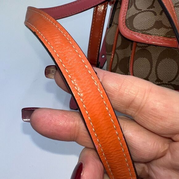 Coach Legacy Signature Canvas Crossbody Bag with a turn-lock closure. - Picture 4 of 11